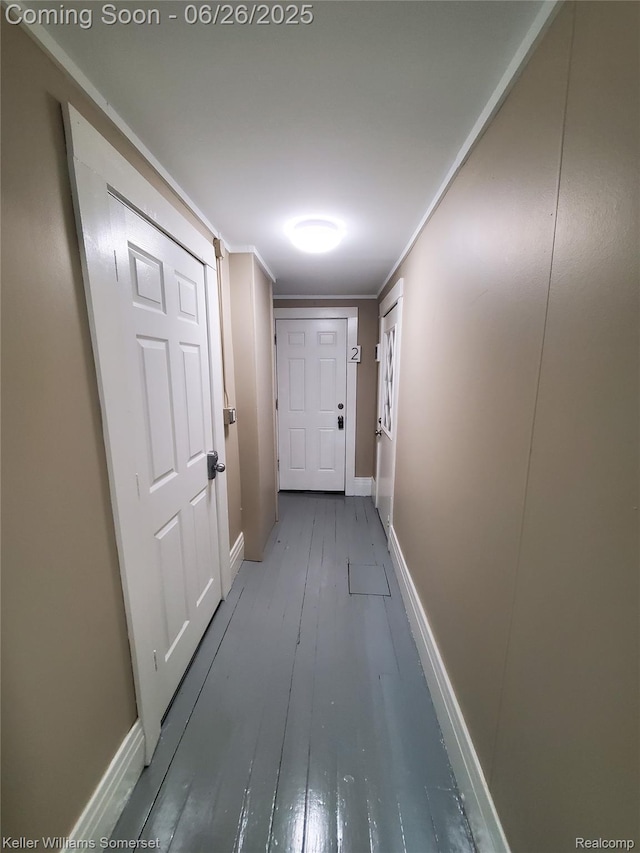3909 Electric Ave, Port Huron, MI 48060 - hallway featuring wood-type flooring and baseboards