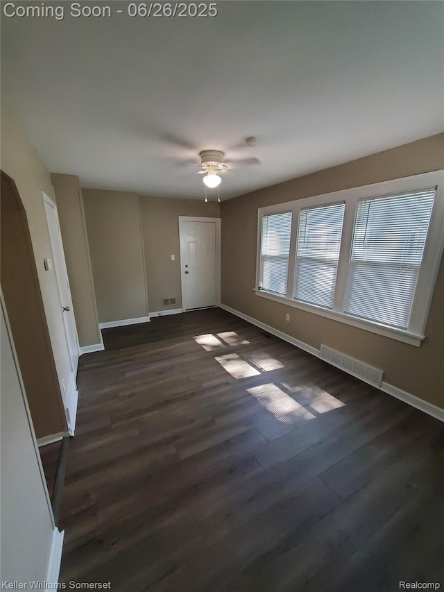 3909 Electric Ave, Port Huron, MI 48060 - spare room featuring a ceiling fan and dark wood-style floors