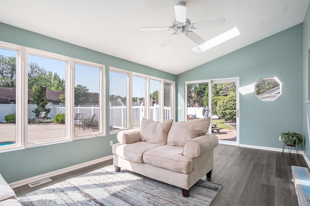 2104 Waterbury Dr SE, Kentwood, MI 49508 - sunroom / solarium featuring a skylight and vaulted ceiling