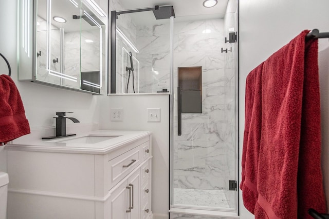 2104 Waterbury Dr SE, Kentwood, MI 49508 - bathroom featuring a marble finish shower and vanity