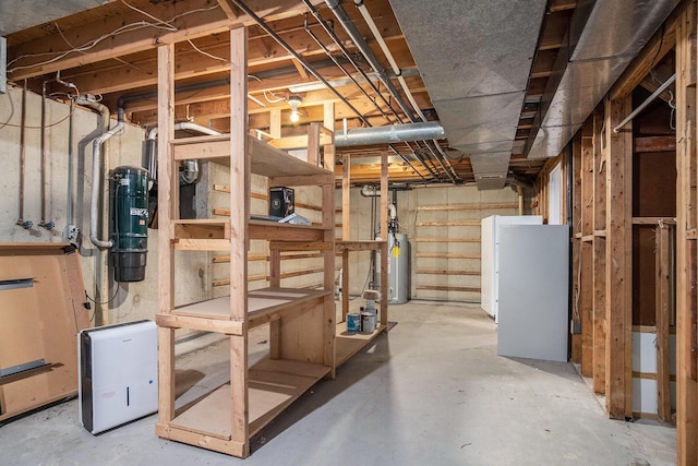 2104 Waterbury Dr SE, Kentwood, MI 49508 - unfinished basement with water heater and a central vacuum unit