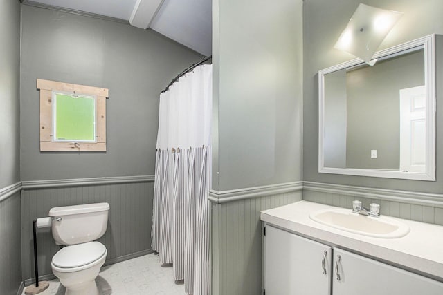 12467 S Running Deer Ln, Grant, MI 49327 - full bathroom with vanity, a wainscoted wall, tile patterned floors, and curtained shower