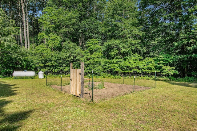 12467 S Running Deer Ln, Grant, MI 49327 - view of green lawn with a view of trees