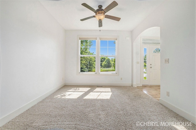 7511 Emerald Woods SE, Byron Center, MI 49315 - carpeted empty room with ceiling fan and baseboards