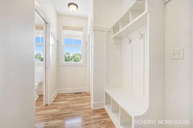 7511 Emerald Woods SE, Byron Center, MI 49315 - mudroom with light wood-style flooring and baseboards