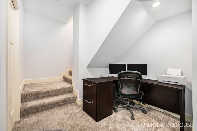 7511 Emerald Woods SE, Byron Center, MI 49315 - carpeted home office with vaulted ceiling and recessed lighting