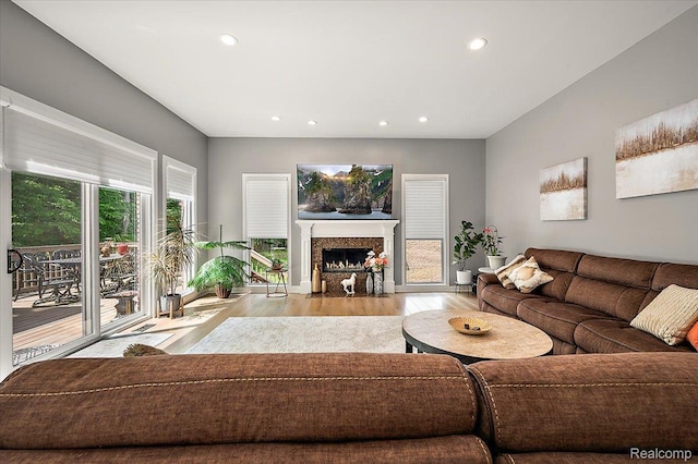 6280 Branford Dr, West Bloomfield, MI 48322 - living area with wood finished floors, recessed lighting, and a fireplace with flush hearth