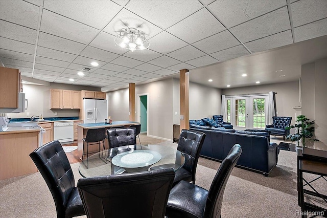 6280 Branford Dr, West Bloomfield, MI 48322 - dining area with light colored carpet, french doors, and recessed lighting