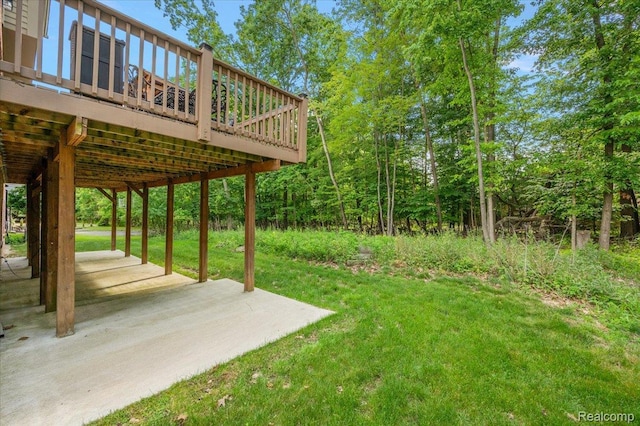 6280 Branford Dr, West Bloomfield, MI 48322 - view of green lawn featuring a deck and a patio area