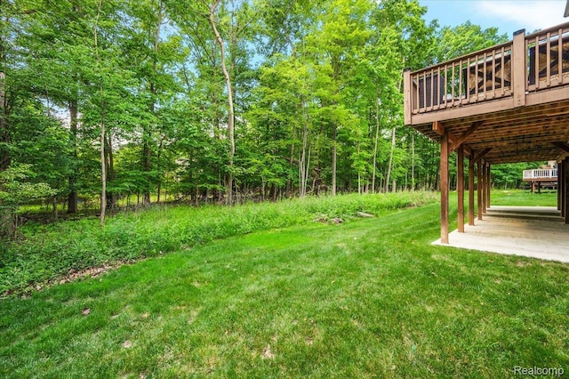 6280 Branford Dr, West Bloomfield, MI 48322 - view of grassy yard with a deck