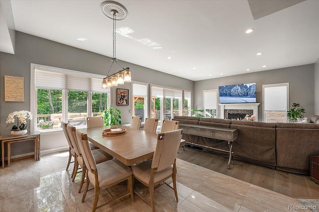 6280 Branford Dr, West Bloomfield, MI 48322 - dining space featuring recessed lighting and a warm lit fireplace
