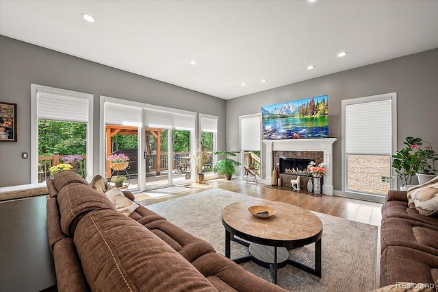 6280 Branford Dr, West Bloomfield, MI 48322 - living room with wood finished floors, recessed lighting, and a premium fireplace