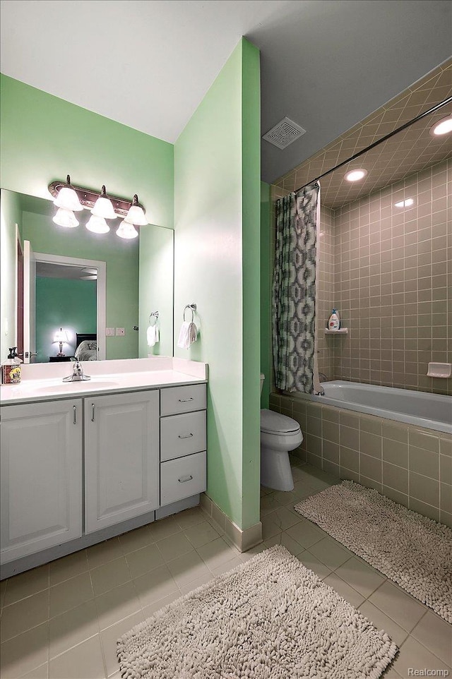 6280 Branford Dr, West Bloomfield, MI 48322 - bathroom featuring tile patterned flooring, vanity, and tiled shower / bath