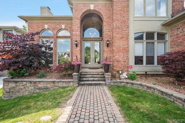 6280 Branford Dr, West Bloomfield, MI 48322 - doorway to property with french doors and brick siding