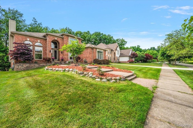 6280 Branford Dr, West Bloomfield, MI 48322 - traditional home featuring a chimney, a front lawn, and brick siding