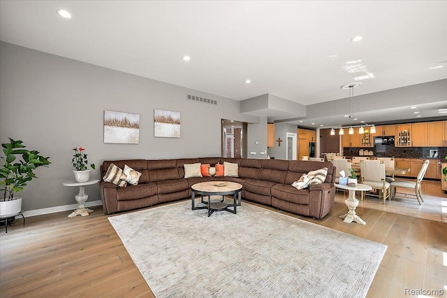 6280 Branford Dr, West Bloomfield, MI 48322 - living room with light wood-type flooring and recessed lighting