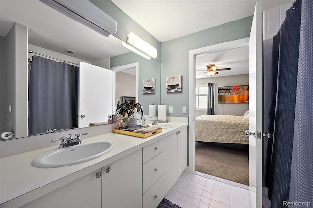 6280 Branford Dr, West Bloomfield, MI 48322 - bathroom featuring double vanity, ceiling fan, ensuite bath, tile patterned flooring, and a shower with shower curtain