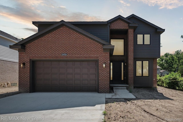 2921 Walsh Dr, Rochester Hills, MI 48309 - view of front of house featuring brick siding, concrete driveway, and an attached garage