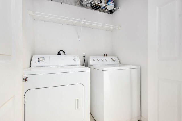 1377 Fox Pointe Cir, Ann Arbor, MI 48108 - laundry room featuring washing machine and dryer