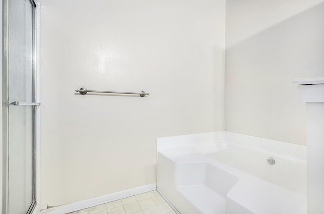 1377 Fox Pointe Cir, Ann Arbor, MI 48108 - full bath featuring a bath, a stall shower, and tile patterned floors