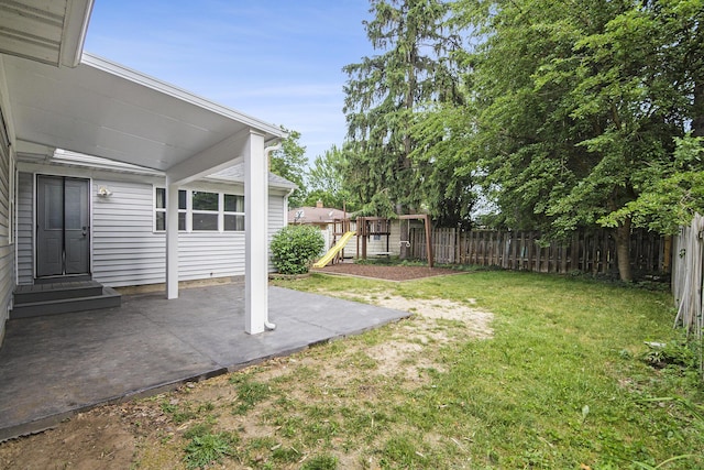 1915 Orville St SE, Grand Rapids, MI 49506 - view of yard with a patio, a playground, and entry steps