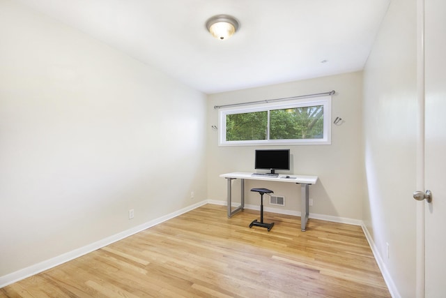 1915 Orville St SE, Grand Rapids, MI 49506 - unfurnished office with light wood finished floors and baseboards