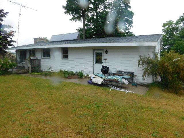 3509 E Taylor Rd, Hart, MI 49420 - rear view of property with a lawn