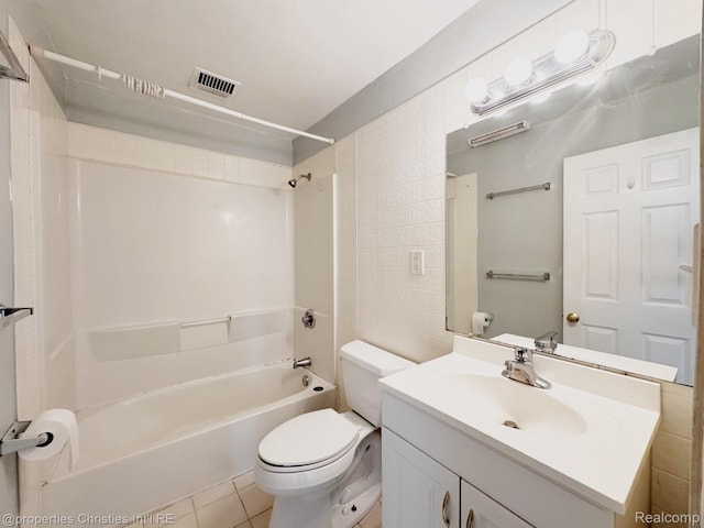 2343 Bonner St, Ferndale, MI 48220 - bathroom featuring  shower combination, vanity, tile patterned floors, and tile walls