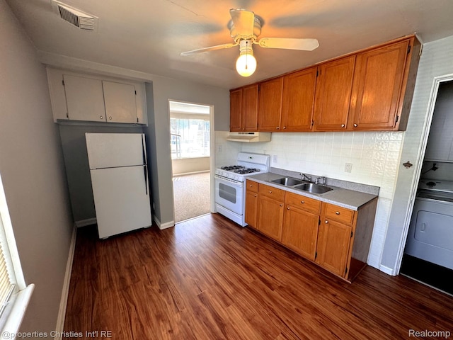 2343 Bonner St, Ferndale, MI 48220 - kitchen featuring white appliances, under cabinet range hood, dark wood finished floors, ceiling fan, and brown cabinets