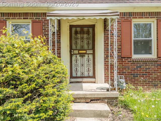 13980 Prevost St, Redford, MI 48227 - view of exterior entry featuring brick siding