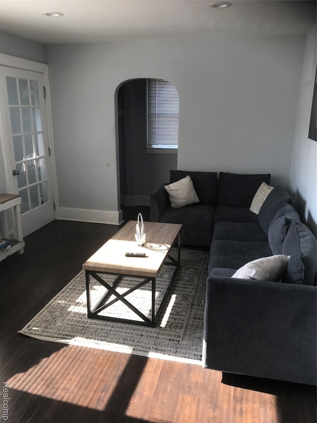 18522 Joseph Campau St, Detroit, MI 48234 - living room with wood finished floors, arched walkways, and recessed lighting