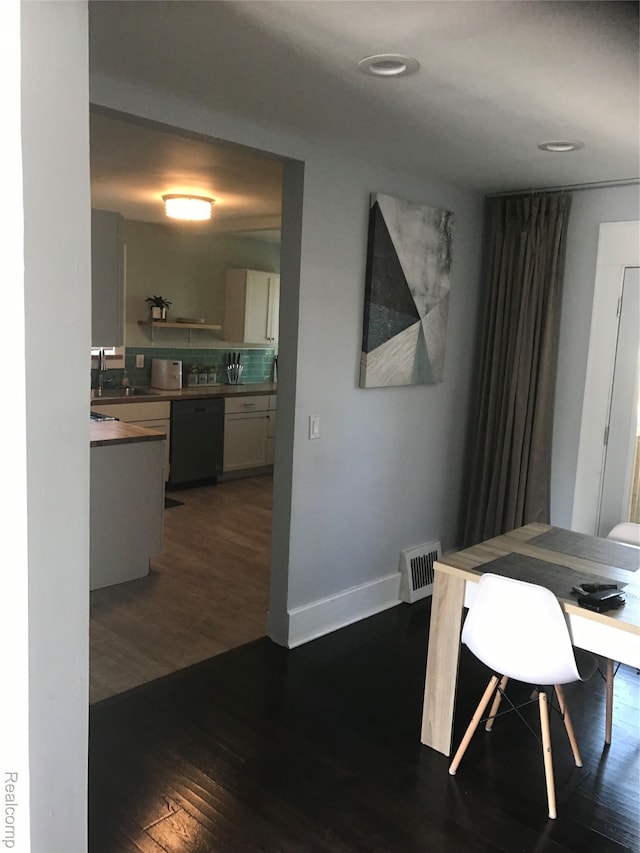 18522 Joseph Campau St, Detroit, MI 48234 - dining area with dark wood-style floors, an office area, and recessed lighting