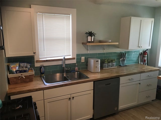 18522 Joseph Campau St, Detroit, MI 48234 - kitchen featuring butcher block counters, dishwasher, tasteful backsplash, and stove
