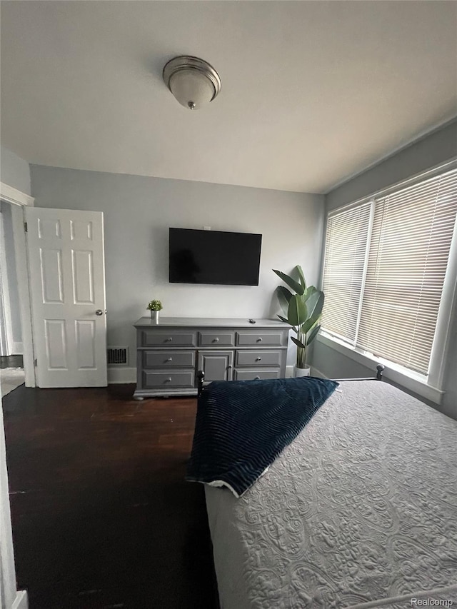 18522 Joseph Campau St, Detroit, MI 48234 - bedroom with baseboards and dark wood-style flooring