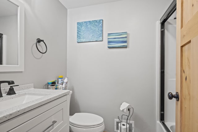 10456 Ferris Ave, Grant, MI 49327 - bathroom featuring vanity and bath / shower combo with glass door