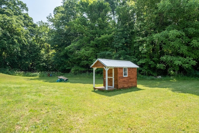 10456 Ferris Ave, Grant, MI 49327 - view of green lawn with a shed