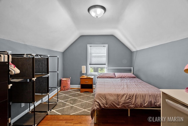 1426 Lancashire SE, Grand Rapids, MI 49508 - bedroom with wood finished floors and lofted ceiling