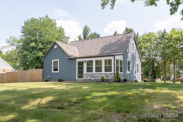1426 Lancashire SE, Grand Rapids, MI 49508 - view of front of home with a shingled roof and stone siding