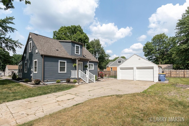 1426 Lancashire SE, Grand Rapids, MI 49508 - view of front of property with an outdoor structure, a garage, and a shingled roof