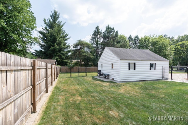 1426 Lancashire SE, Grand Rapids, MI 49508 - fenced backyard featuring a patio area