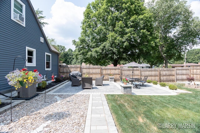 1426 Lancashire SE, Grand Rapids, MI 49508 - fenced backyard with a patio and cooling unit