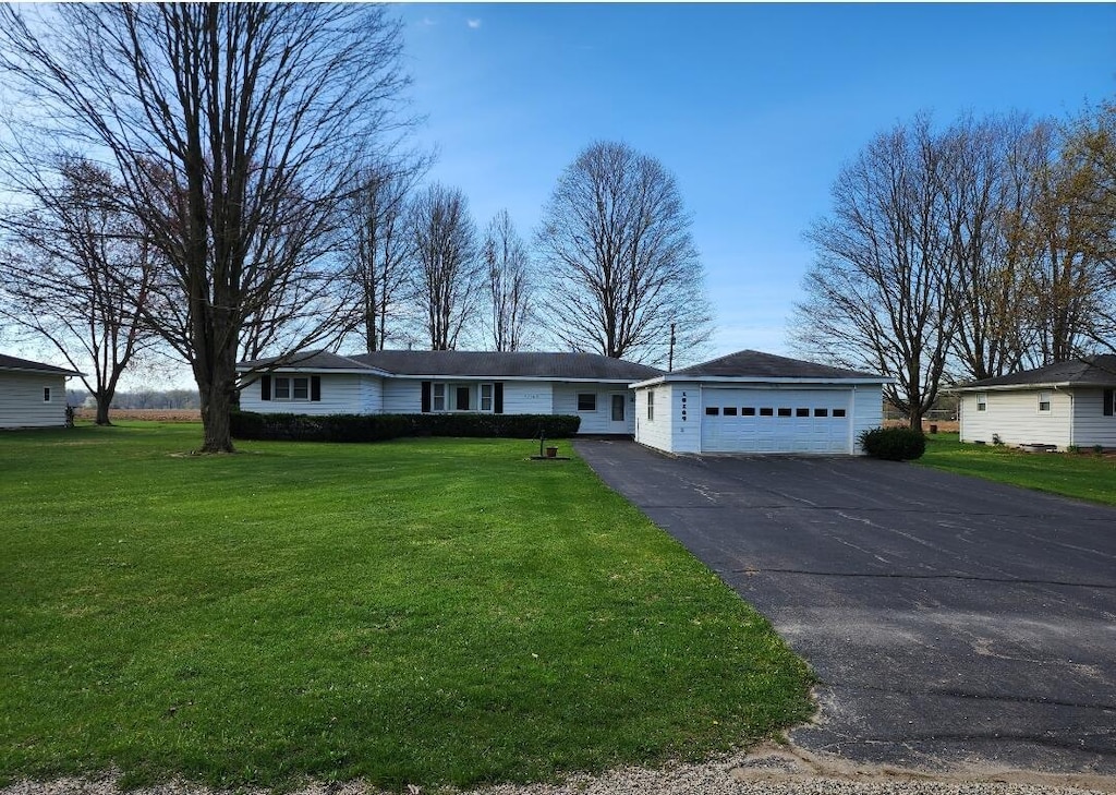 18169 6th Avenue Rd, Three Rivers, MI 49093 - single story home with a front lawn and a garage