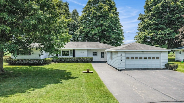 18169 6th Avenue Rd, Three Rivers, MI 49093 - ranch-style home with a detached garage, a front lawn, and an outbuilding