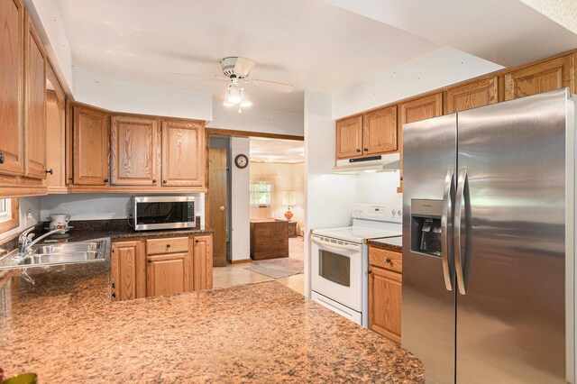 18169 6th Avenue Rd, Three Rivers, MI 49093 - kitchen featuring stainless steel appliances, under cabinet range hood, and ceiling fan