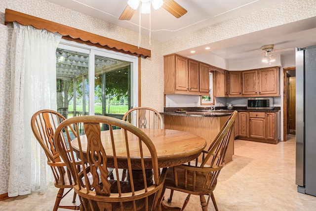 18169 6th Avenue Rd, Three Rivers, MI 49093 - dining space featuring ceiling fan, wallpapered walls, light flooring, and recessed lighting