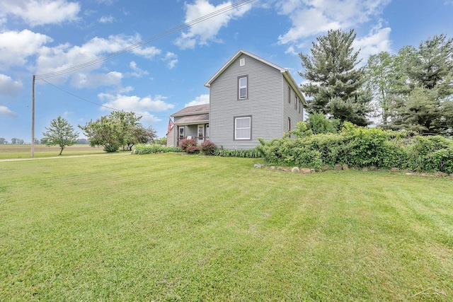 8603 Millington Rd, Vassar, MI 48768 - view of property exterior featuring a yard