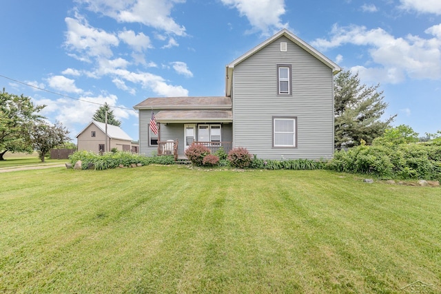 8603 Millington Rd, Vassar, MI 48768 - view of front of home featuring a front lawn and a porch