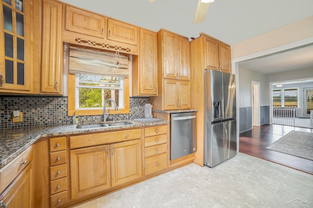 8603 Millington Rd, Vassar, MI 48768 - kitchen with stainless steel appliances, plenty of natural light, and decorative backsplash