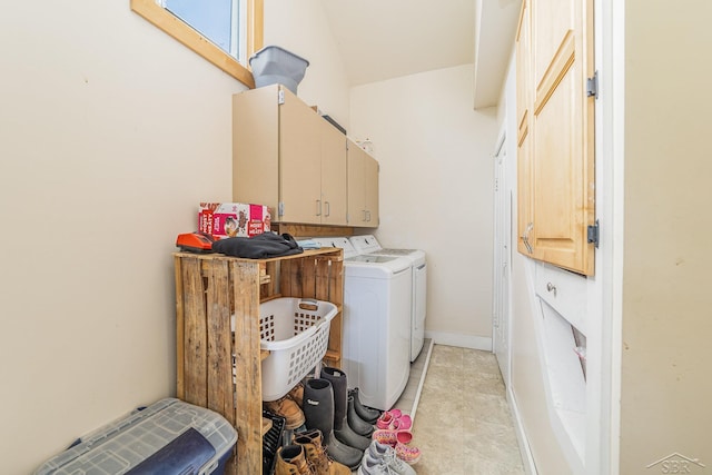 8603 Millington Rd, Vassar, MI 48768 - laundry area with independent washer and dryer, cabinet space, and light tile patterned flooring