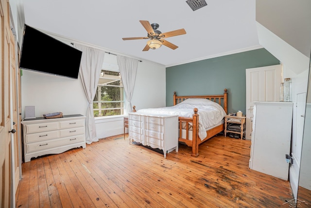 8603 Millington Rd, Vassar, MI 48768 - bedroom with ornamental molding, light wood-type flooring, and ceiling fan